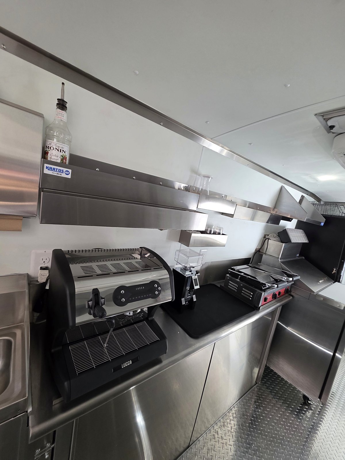 Espresso bar and panini press inside the food truck
