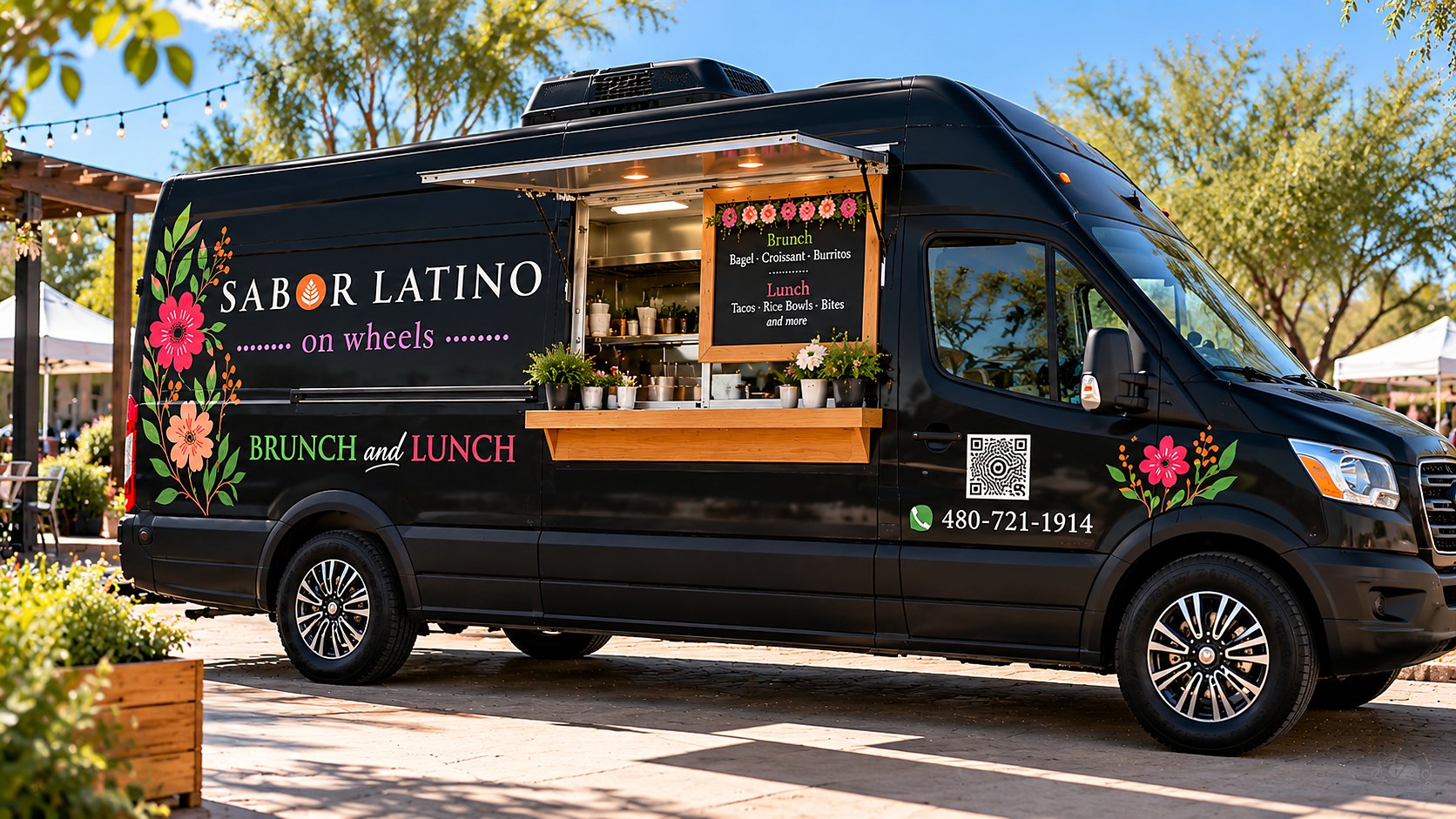 The black Sabor Latino On Wheels food truck with flowers, service window open